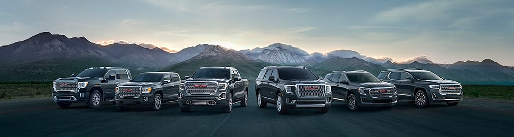 2022 GMC model lineup parked in the mountains