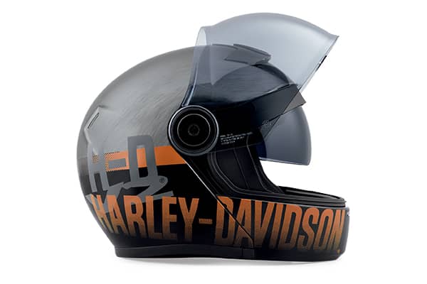 Sideview of a black Harley-Davidson motorcycle helmet with orange text on the bottom edge.