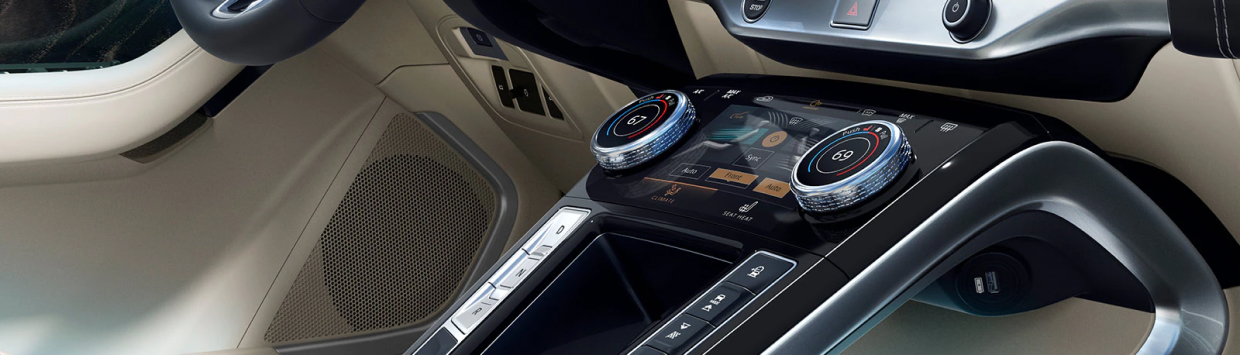 Close up of the I-PACE console featuring buttons, dials and touch screen
