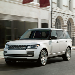 Range rover driving in city
