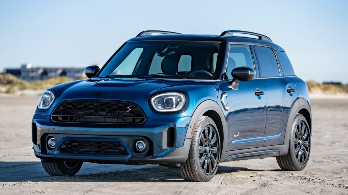 A closer view of the right side of the MINI Countryman Boardwalk Edition parked by  the beach.