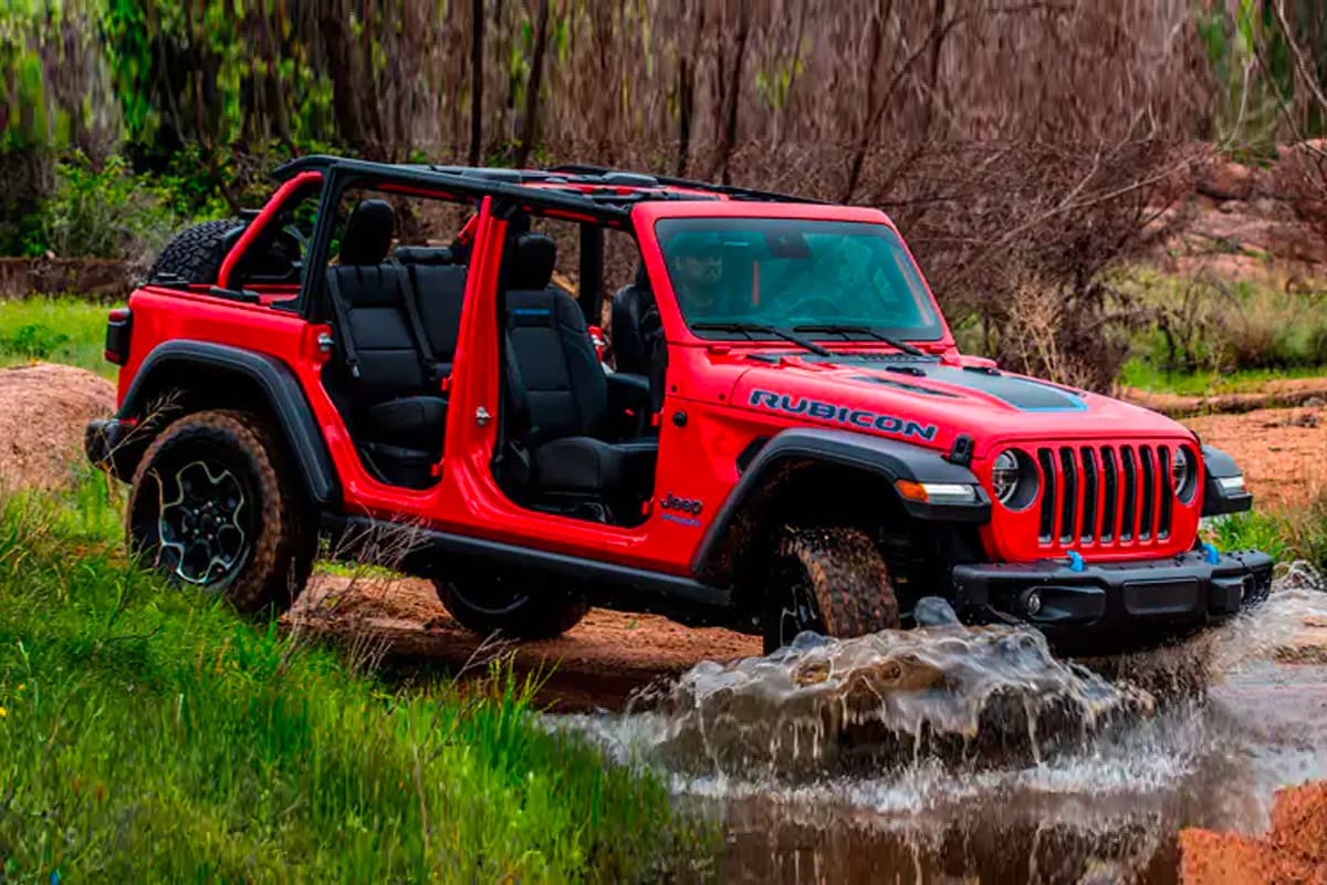 Red Jeep Going Through Water 