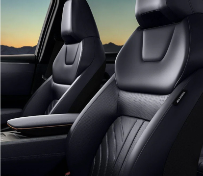 Black leather front seats inside a 2023 Nissan Ariya