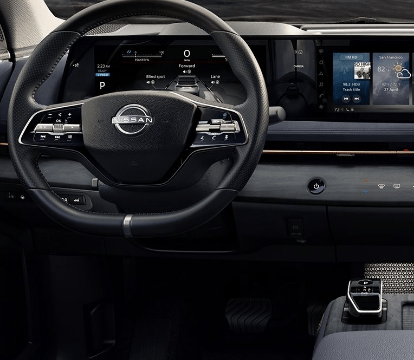 Steering wheel and infotainment screen inside a 2023 Nissan Ariya