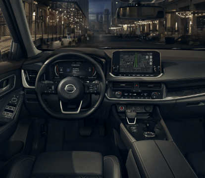 Steering wheel and infotainment screen inside a 2022 Nissan Rogue